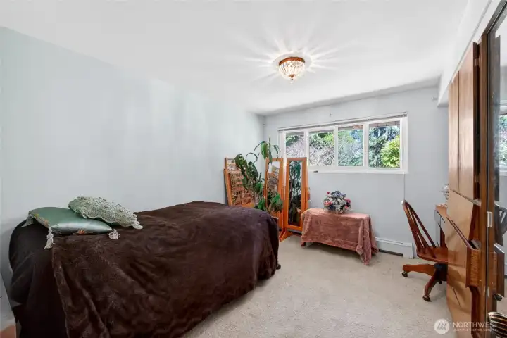 Guest bedroom on main floor. Guest bedroom on main floor.