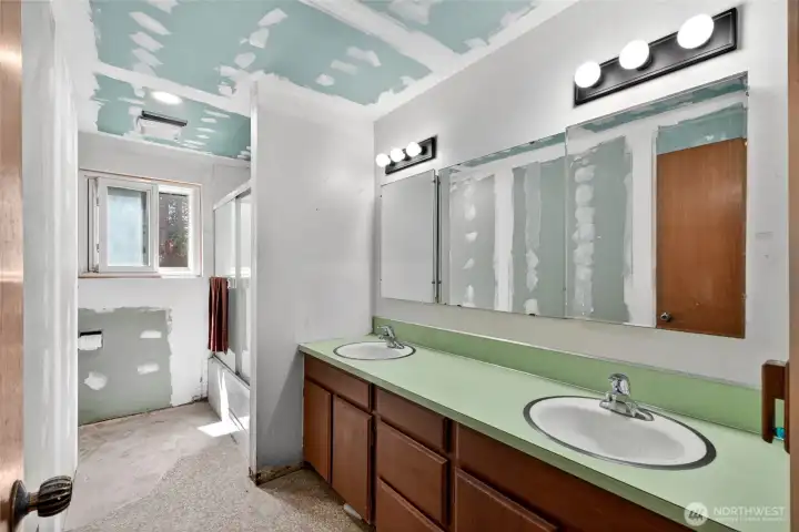 This full bathroom on lower level offers a dual vanity and awaits your vision. This full bathroom on lower level offers a dual vanity and awaits your vision.