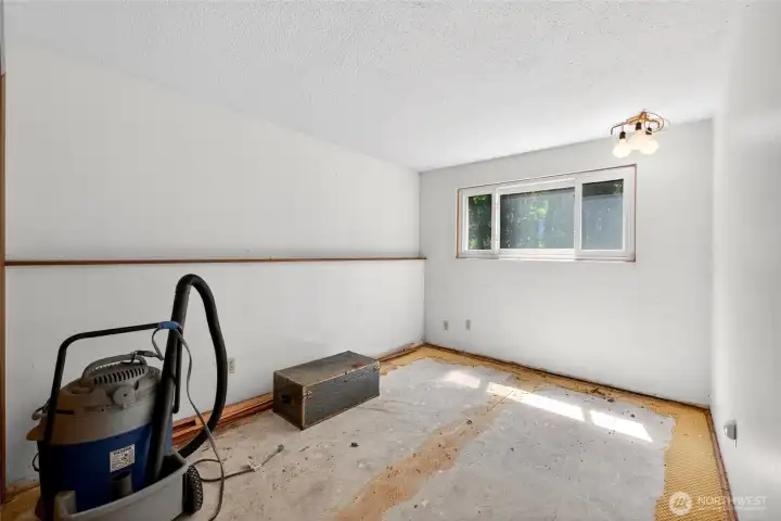 One of two lower-level bedrooms. One of two lower-level bedrooms.