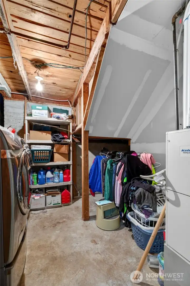 Lower level utility room. Lower level utility room.