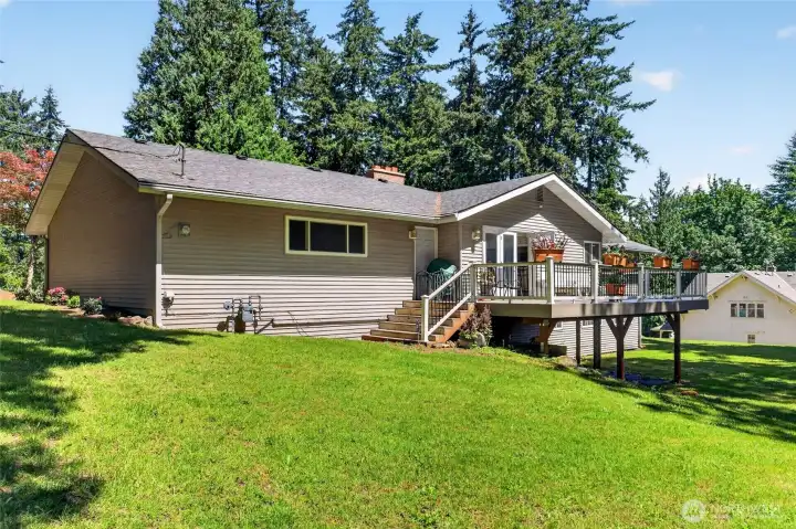 Beautiful deck on backside of home is perfect for entertaining! Beautiful deck on backside of home is perfect for entertaining!