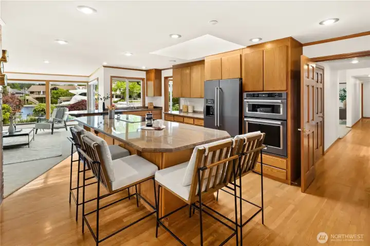 Inspiring open concept kitchen with water view