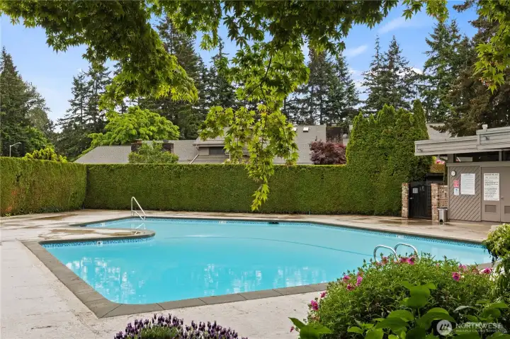 Enjoy the community pool just steps away—perfect for summer relaxation and easy living