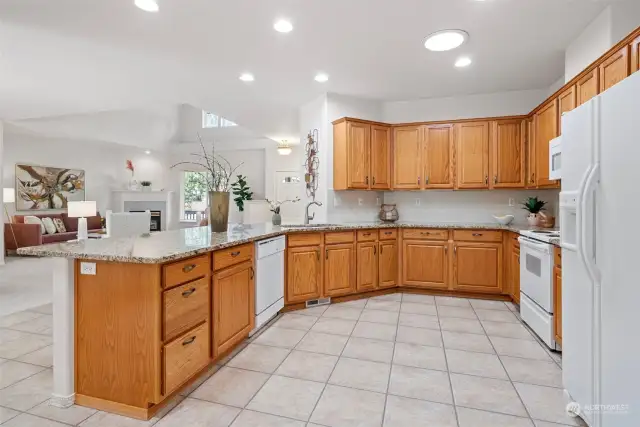 Such a great open concept kitchen. Granite countertops, matching appliances and even a pantry closet make this kitchen a dream for the chef in the house.