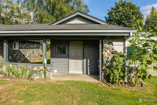 Attached "laundry room" could also be used for a cottage business or even a guest bedroom.