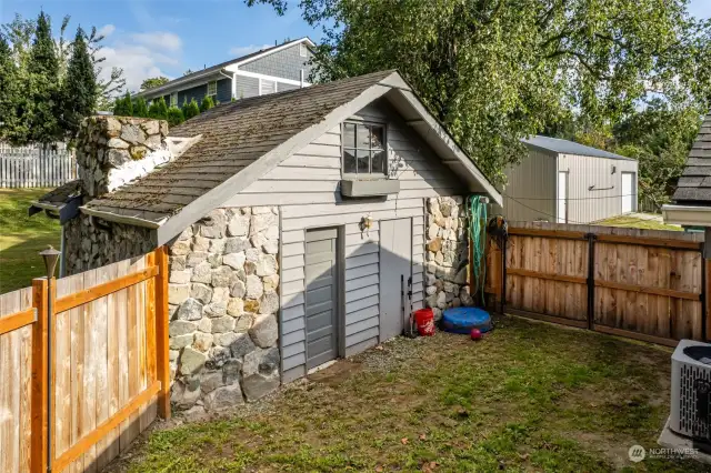 The original cabin has a loft and is a nice dry spot for storage or could be a fun playhouse.