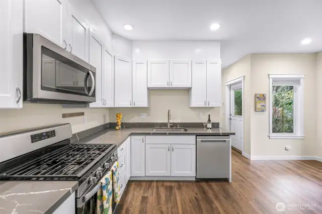 The kitchen has a surprising amount of storage and again, plenty of windows