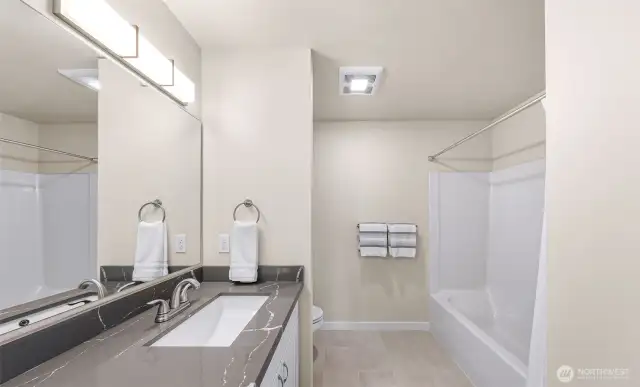 Primary with shower and tub.