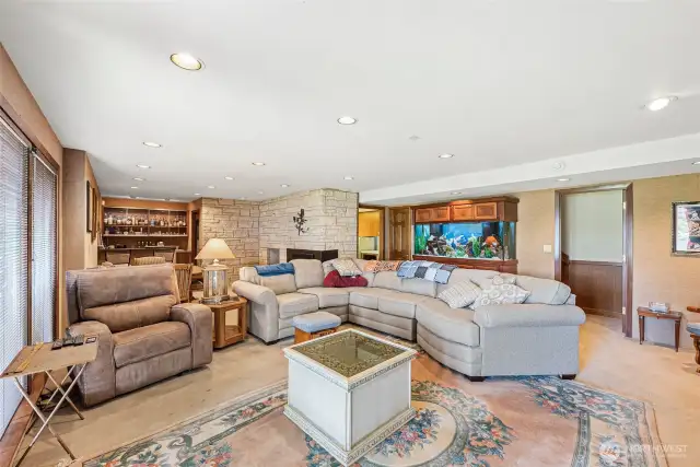 Bonus room on lower level is ready with a wet bar and easy access to the hot tub.