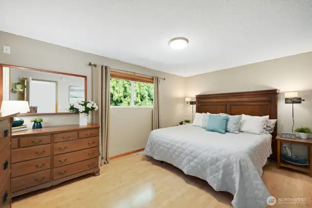 Primary en-suite features 3/4 bath attached. Located in the quiet northwestern corner of the home.