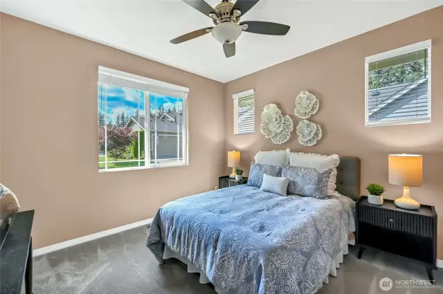The second bedroom easily accommodates a queen-sized bed, nightstands and there is still room for a desk making it a super functional space.