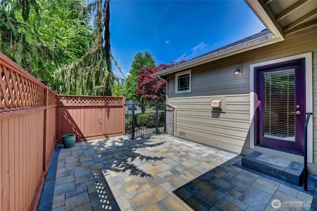 The paver patio off the great room is fully fenced for a pet and is a nice spot to relax with friends.