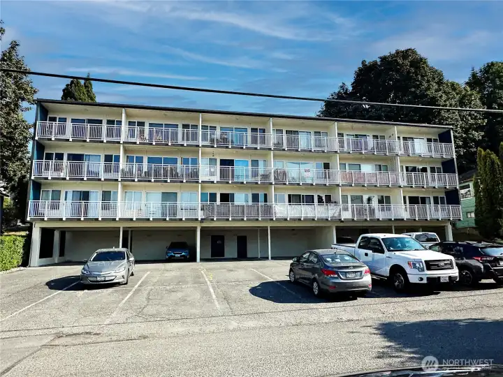 Back of building and parking lot