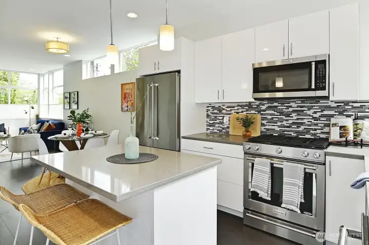Great kitchen! Features gas cooking, island, and quality appliances.
