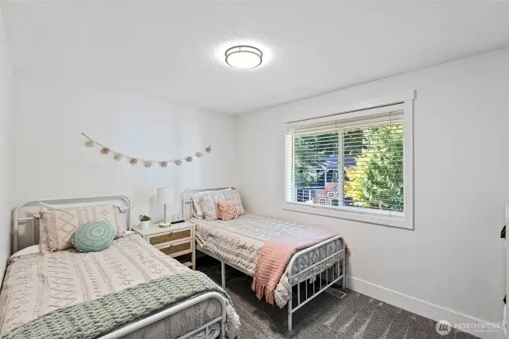 Bedroom 3, located at the back of the hall on the main level.