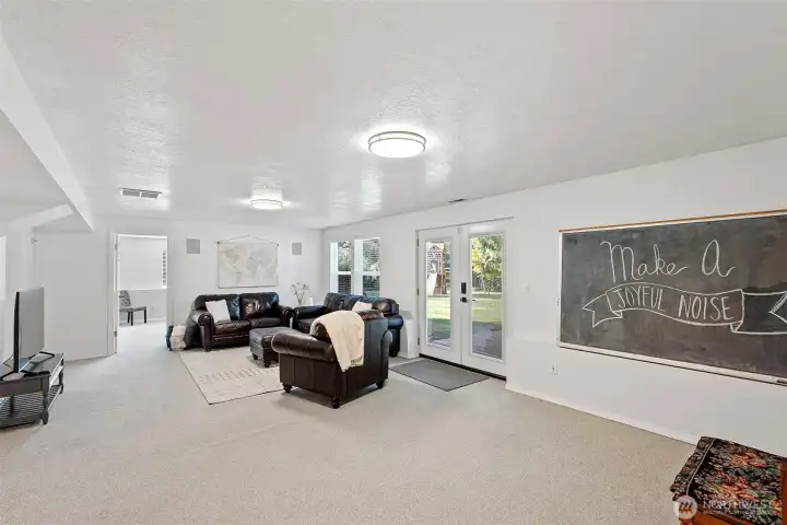 Lower level has French doors out to back patio. Can be used as a separate entrance to the home.