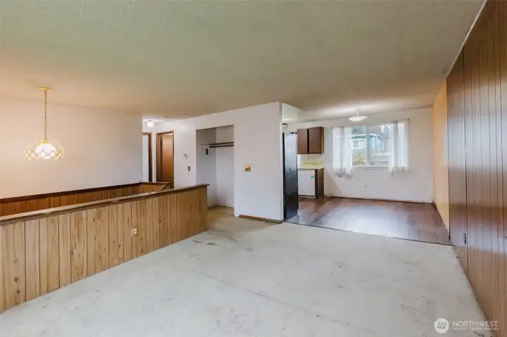 Imaging taking out the wall between the living room and kitchen to create an open concept floorplan!