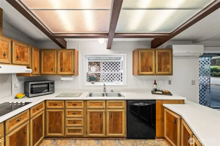 Garden window lets the light in. Bring your favorite plants!