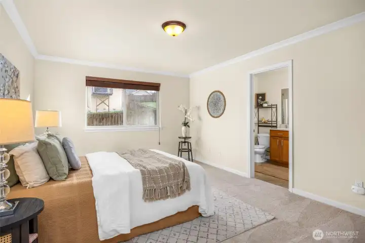 Primary with private bath and walk-in closet