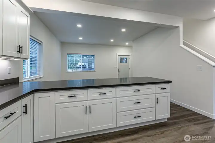 Kitchen looking into living room