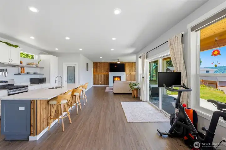 Bright open floor plan enhanced by large windows and natural light. Bright open floor plan enhanced by large windows and natural light.