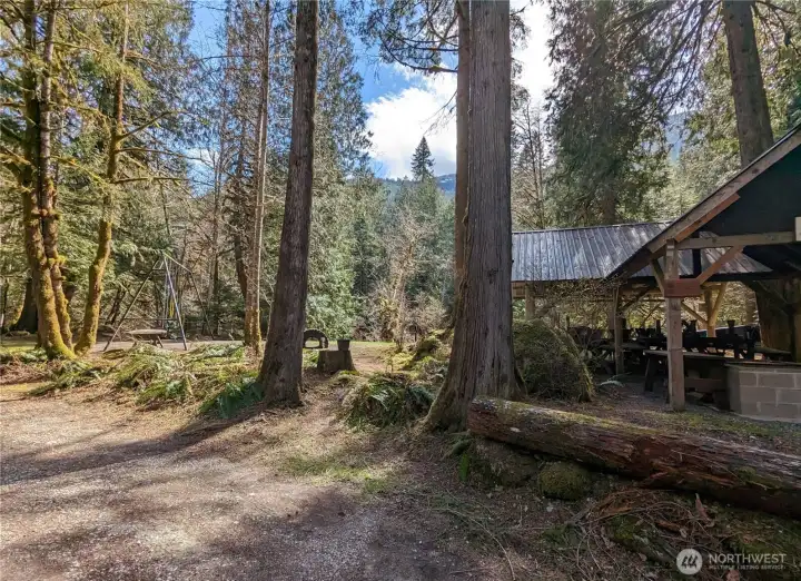 Swing set, bbq, public restrooms, and nearby basketball court