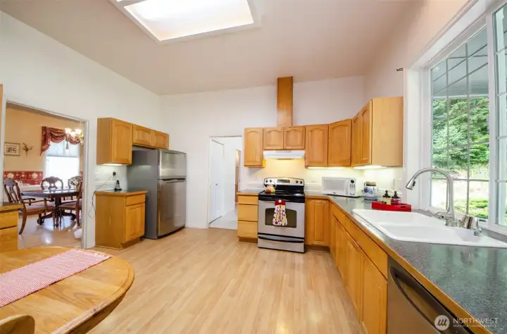 Formal dining room is settled next to kitchen