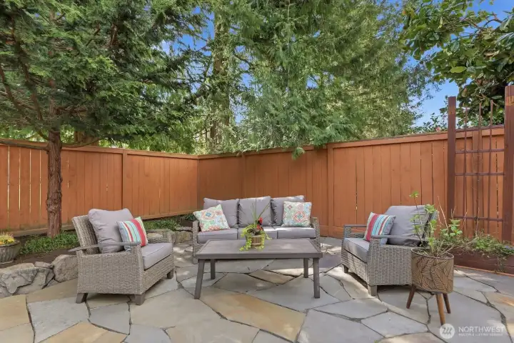 Relax on the beautiful flagstone patio, perfect for peaceful evenings and family & friend get-togethers.