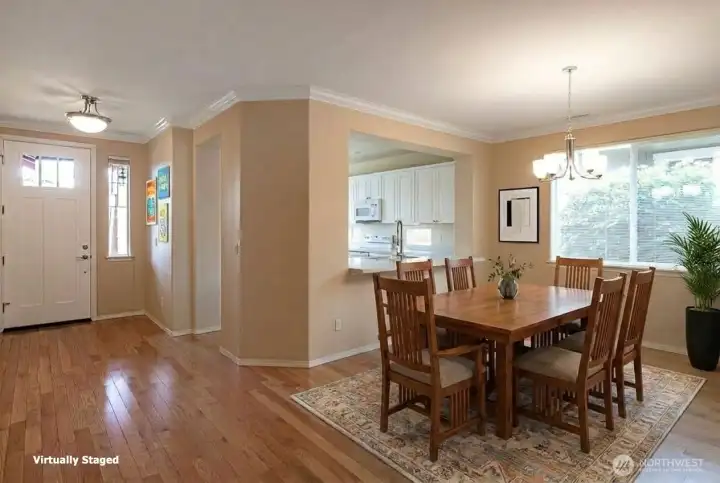 The Woodlands floorplan.  2 bedrooms 1.75 bath home with private den.  Open dining area.