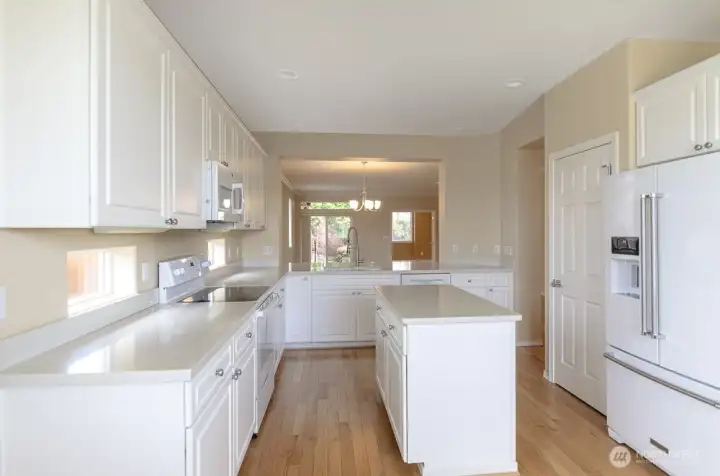 Recipe windows add natural light.  Upgraded newer refrigerator and dishwasher.