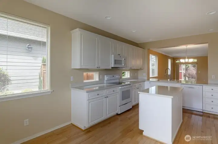 Chef's island conveniently located near the smooth top stove.