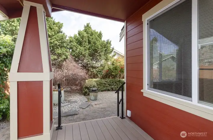 Covered back deck off living room.  Enjoy the outdoors no matter what the weather.