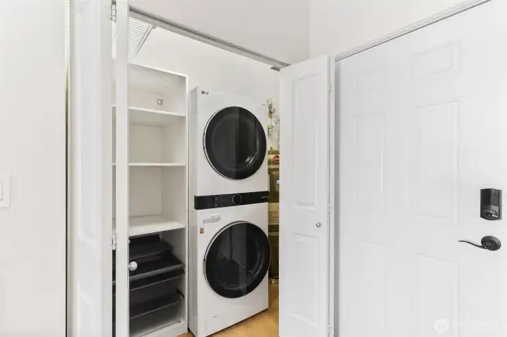 Stackable laundry with built in shelving for extra storage