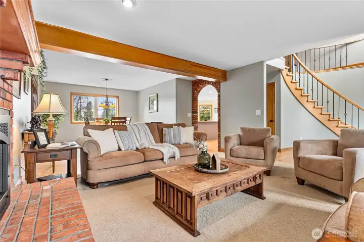 Living room and family room well-placed on opposite corners of home - perfect for large entertaining