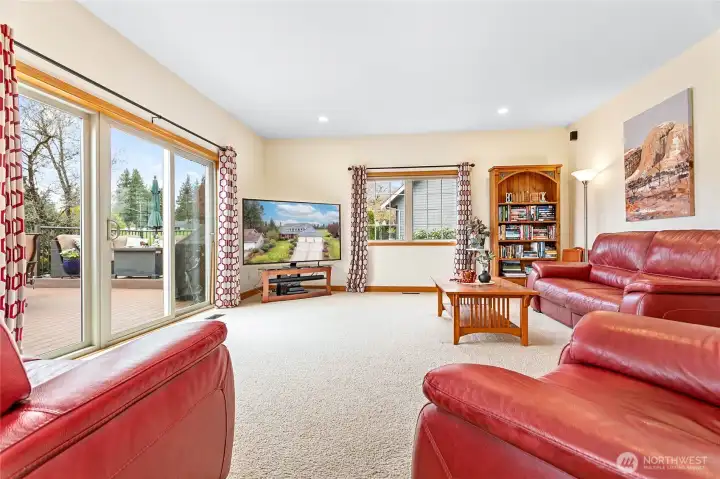 High-end windows/doors throughout home. Expansive custom trex 2-level deck just off slider