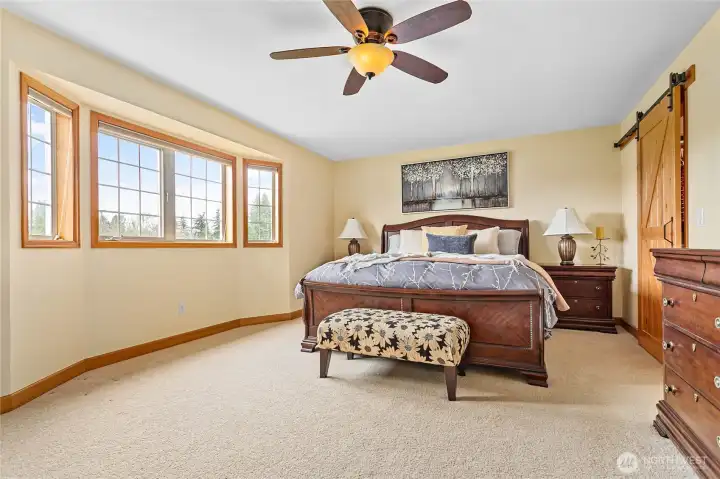 Enormous owner's suite with bay window, large walk-in closet and recently updated ensuite bathroom