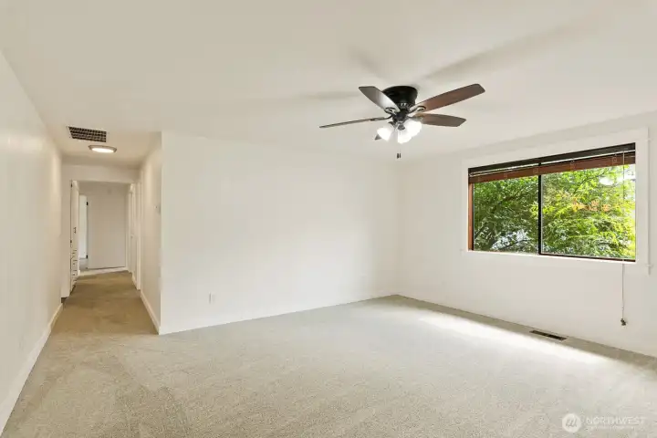 Hall from Family room leads to bedrooms and guest bath