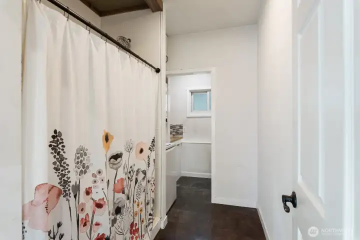 Guest space bath and laundry