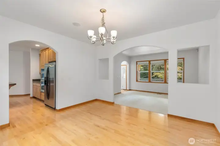 Natural light, hardwood floors, and an easy flow to the kitchen make this a practical and comfortable place to gather. Natural light, hardwood floors, and an easy flow to the kitchen make this a practical and comfortable place to gather.