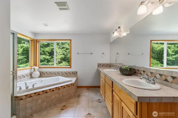 Primary bath with soaking tub. Primary bath with soaking tub.