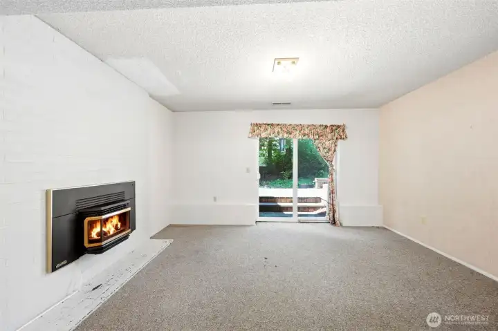 Family room with gas fireplace insert.