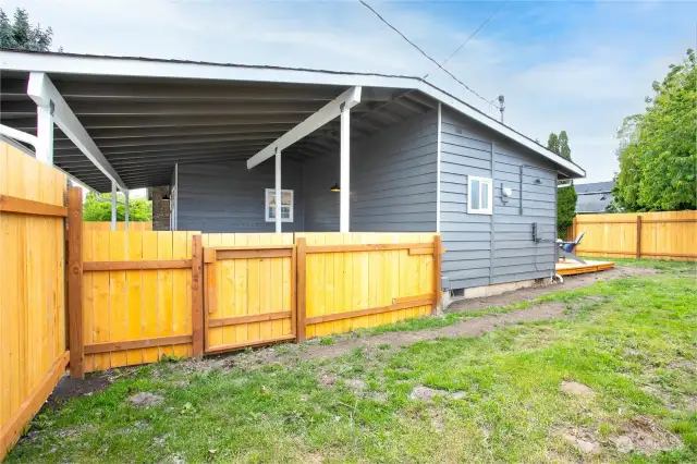 Privacy surrounds the backyard with a brand new cedar fence.