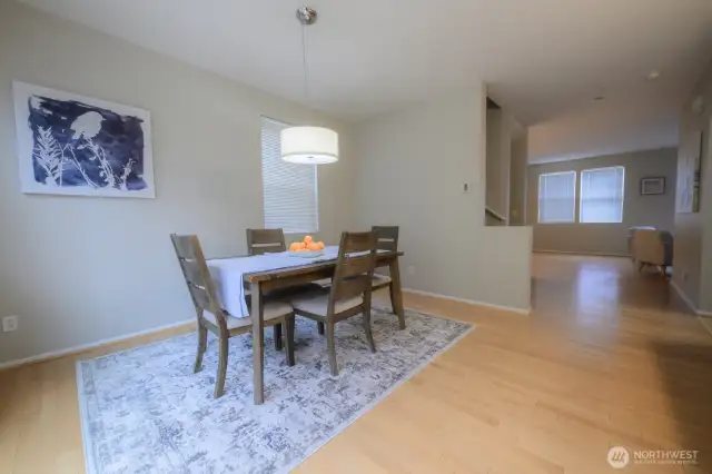 The dining room connects easily to the living space—ideal for hosting or everyday meals.