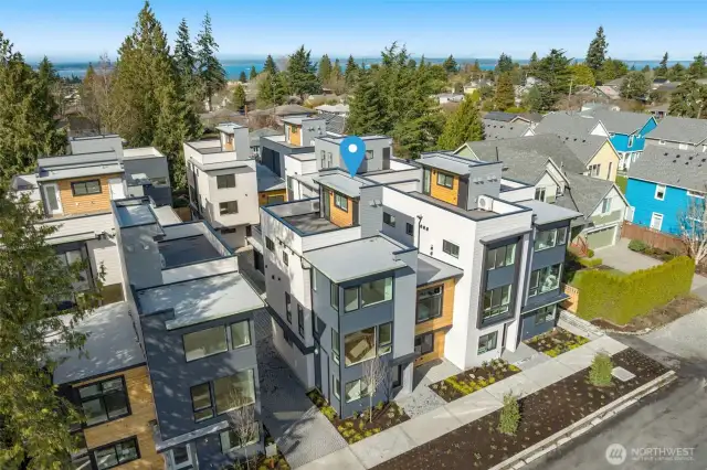 Welcome to Ivy North! This sleek collection of contemporary homes sits across from Crown Hill Park, where modern design meets Pacific Northwest vibes. That rooftop? Yeah, it’s all yours.