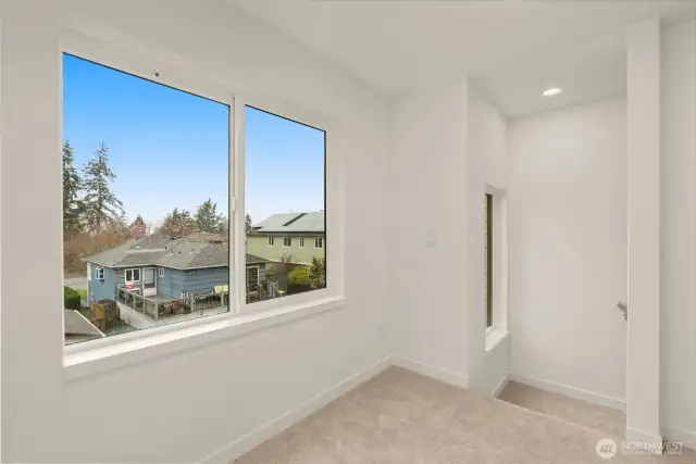 This corner office/den is perfect for a work-from-home setup. Morning coffee + this view? Yes, please.