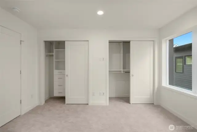Double closets = double the possibilities. Built-ins are on one side, and open storage is on the other. It’s a wardrobe wonderland.