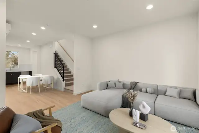 This image is virtually staged. This main level gives a modern-day blank canvas. Whether minimalist or maximalist, this space is ready to match your style.