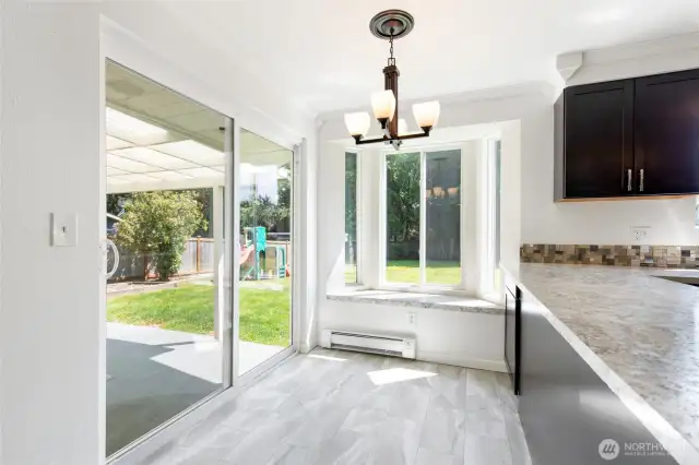 Sliding door to covered patio, shed and yard