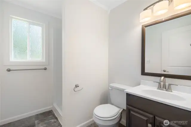 .75 bath is right off of the utility room