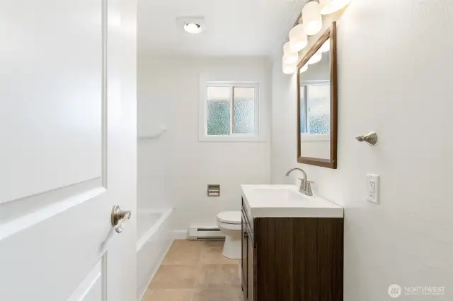 Full bathroom with tub